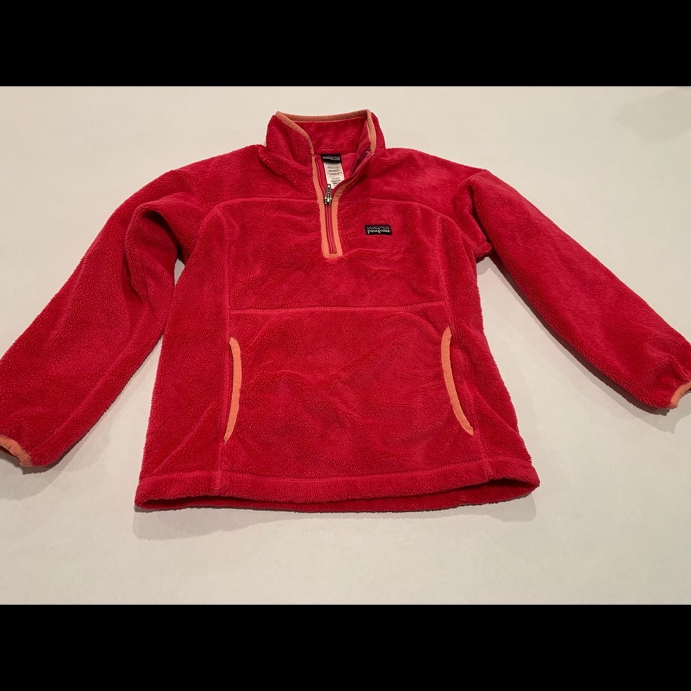Patagonia pullover with zipper at neck. Bright pink, size girl’s small, (8).